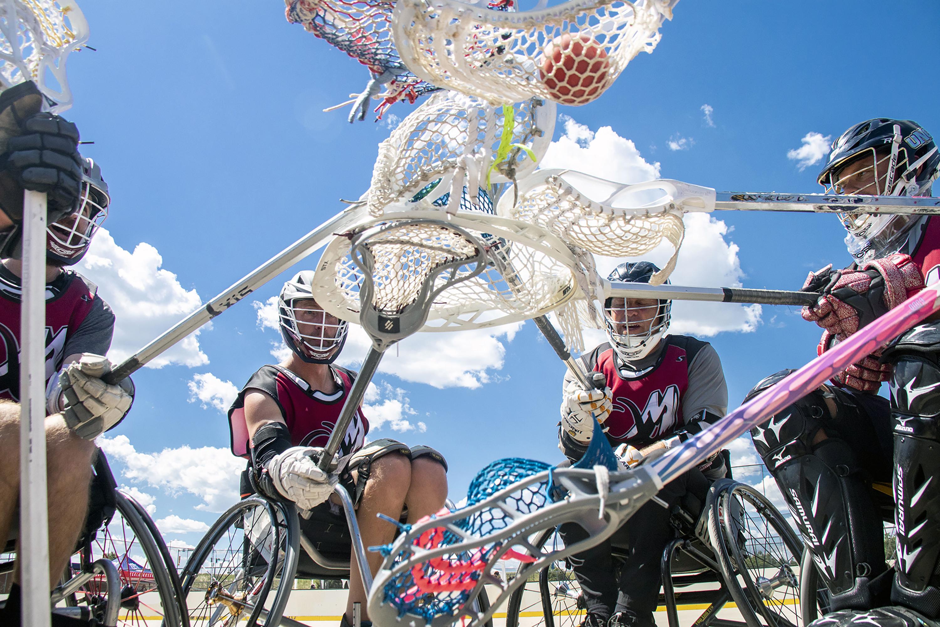 Wheelchair lacrosse athletes push sport with Colorado roots AP News
