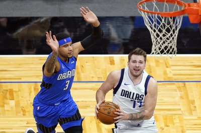 Con 33 puntos de Doncic, Mavs vencen al Magic | AP News