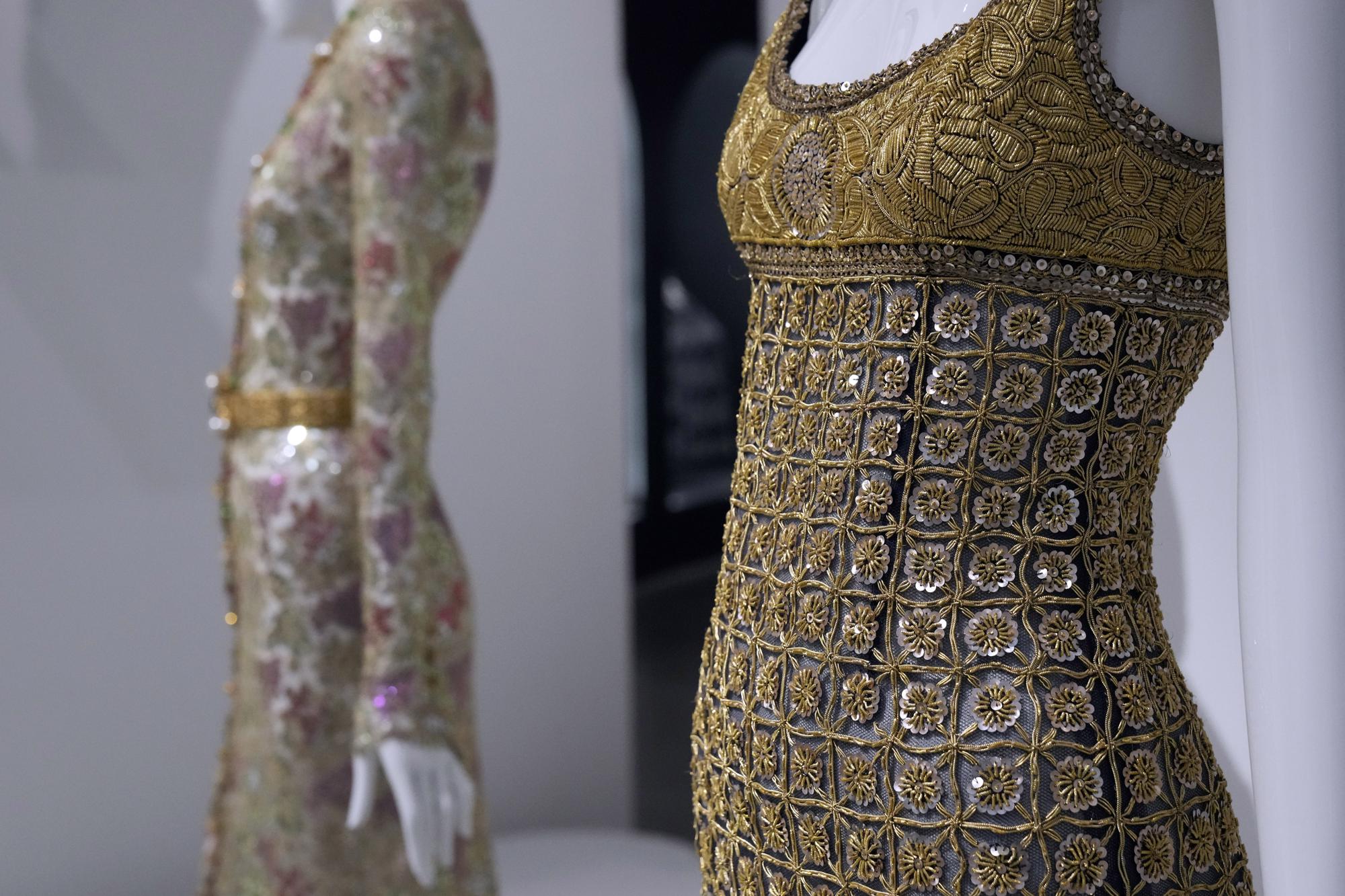 Designs by Karl Lagerfeld are displayed at the Metropolitan Museum of Art's Costume Institute exhibition, "Karl Lagerfeld: A Line of Beauty," on Saturday, April 29, 2023, in New York. (Photo by Charles Sykes/Invision/AP)