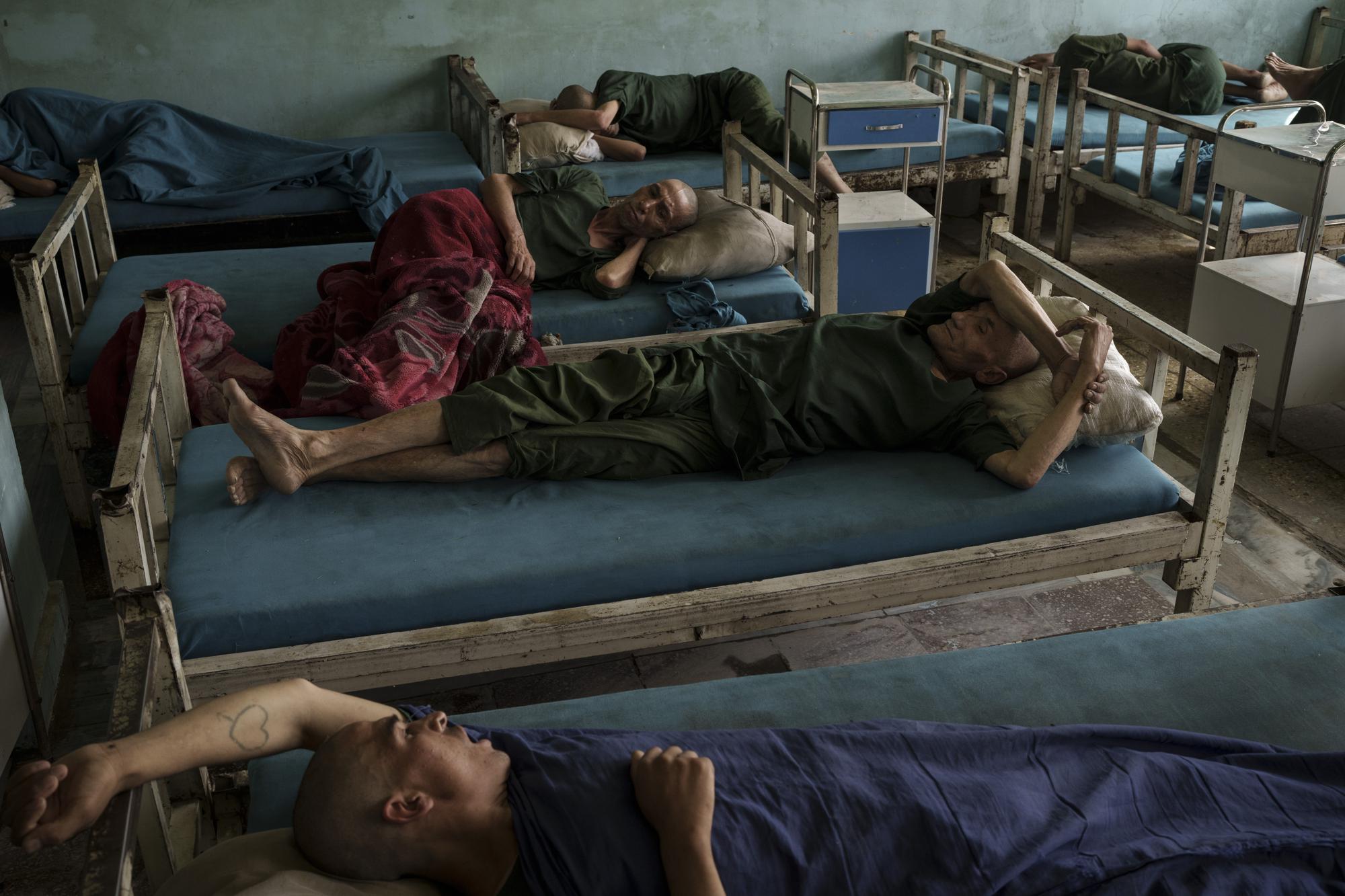Taliban invokes Islam to weed out drugs from Afghanistan war begins with shaved heads for addicts