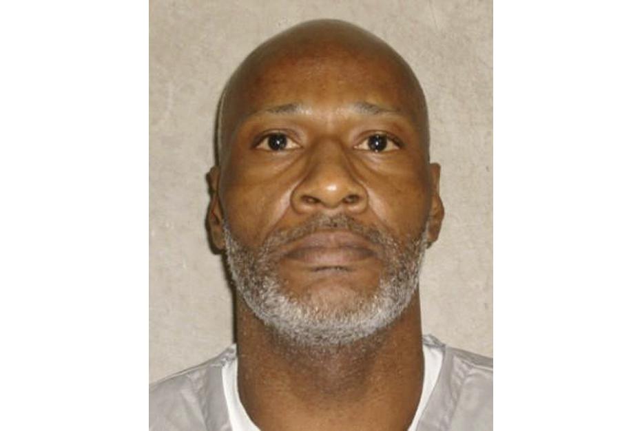 FILE - This undated file photo provided by the Oklahoma Department of Corrections shows death row inmate John M. Grant. Oklahoma's Pardon and Parole Board on Tuesday, Oct. 5, 2021, has narrowly rejected granting clemency for Grant, who was convicted of killing a prison cafeteria worker in 1998. (Oklahoma Department of Corrections via AP, File)