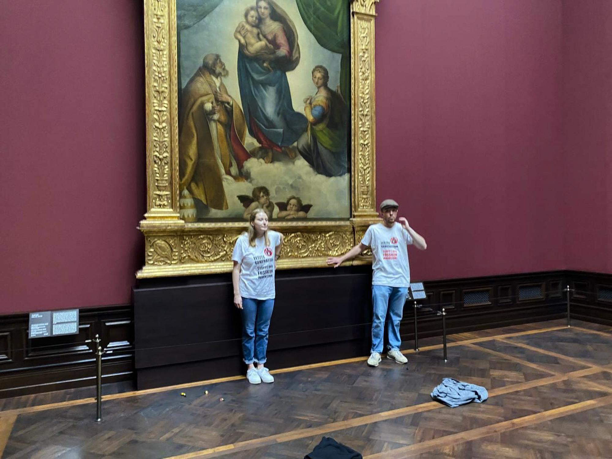 Climate Activists Glue Their Hands To Famous Paintings In Protest