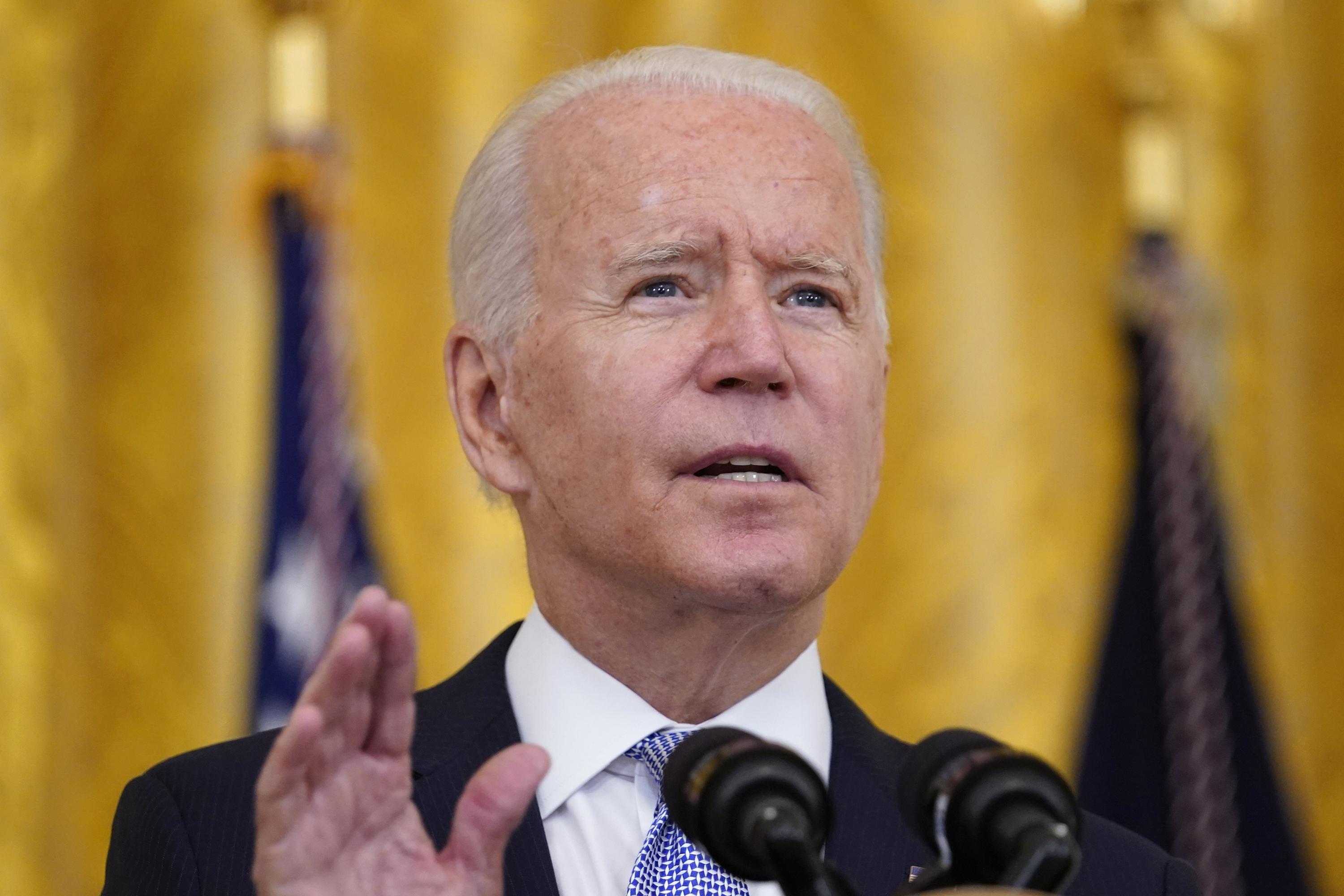 Biden orders tough new vaccination rules for federal workers