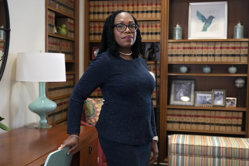 FILE - Judge Ketanji Brown Jackson, a U.S. Circuit Judge on the U.S. Court of Appeals for the District of Columbia Circuit, poses for a portrait, Feb., 18, 2022, in her office at the court in Washington. Jackson's Supreme Court nomination confirmation hearing starts March 21. If confirmed, she would be the court's first Black female justice. (AP Photo/Jacquelyn Martin, File)