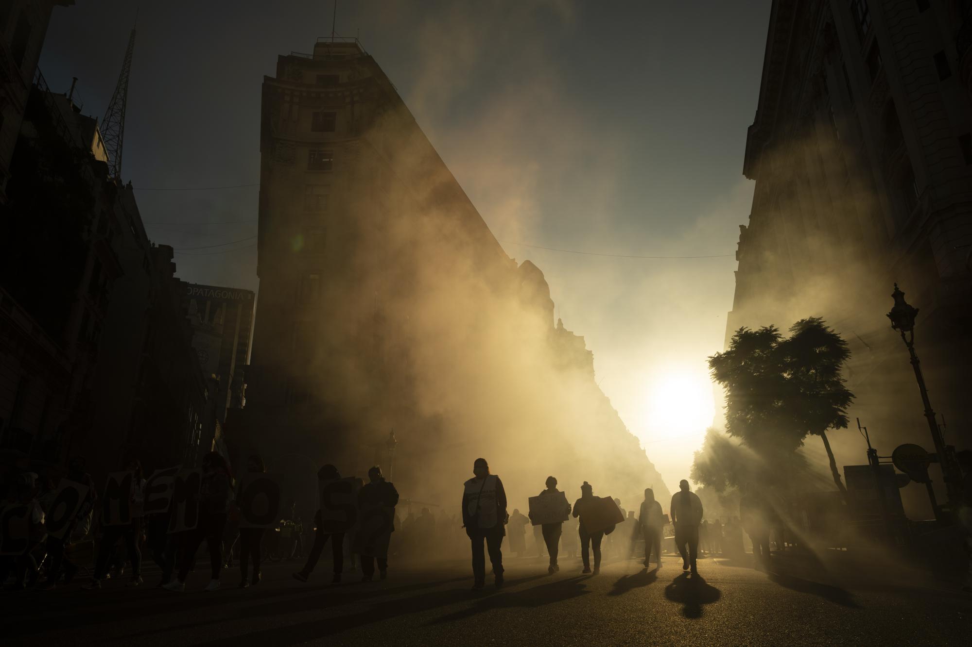 Protesters arrive at the Plaza de Mayo to demand higher salaries and more jobs, in Buenos Aires, Argentina, Thursday, May 12, 2022. (AP Photo/Victor R. Caivano)