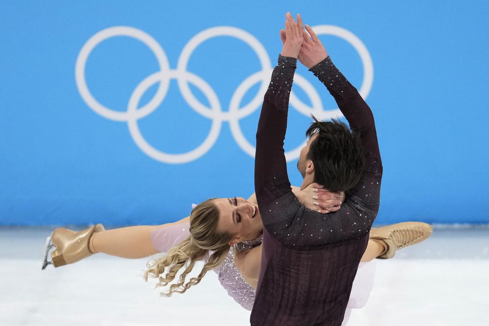 Madison Hubbell and Zachary Donohue, of the United States, perform their routine in the ice dance competition during the figure skating at the 2022 Winter Olympics, Monday, Feb. 14, 2022, in Beijing. (AP Photo/Natacha Pisarenko)