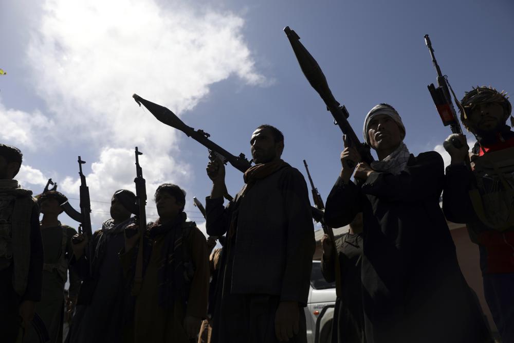 Afghan militiamen join Afghan defense and security forces during a gathering in Kabul, Afghanistan, Wednesday, June 23, 2021. Taliban gains in north Afghanistan, the traditional stronghold of the country's minority ethnic groups who drove the insurgent force from power nearly 20  years ago, has driven a worried government to resurrect militias whose histories have been characterized by chaos and widespread killing. (AP Photo/Rahmat Gul)