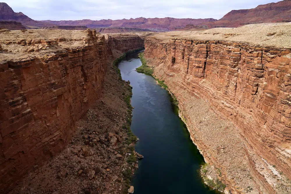 FILE - The Colorado River in the upper River Basin is pictured in Lees Ferry, Ariz., on May 29, 2021. (AP Photo/Ross D. Franklin, File)