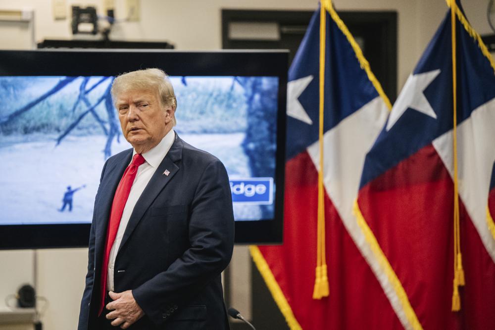 Former President Donald Trump arrives for a border security briefing to discuss further plans in securing the southern border wall on Wednesday, June 30, 2021, in Weslaco, Texas. Trump was invited to South Texas by Gov. Greg Abbott, who has taken up Trump's immigration mantle by vowing to continue building the border wall. (Brandon Bell/Pool via AP)