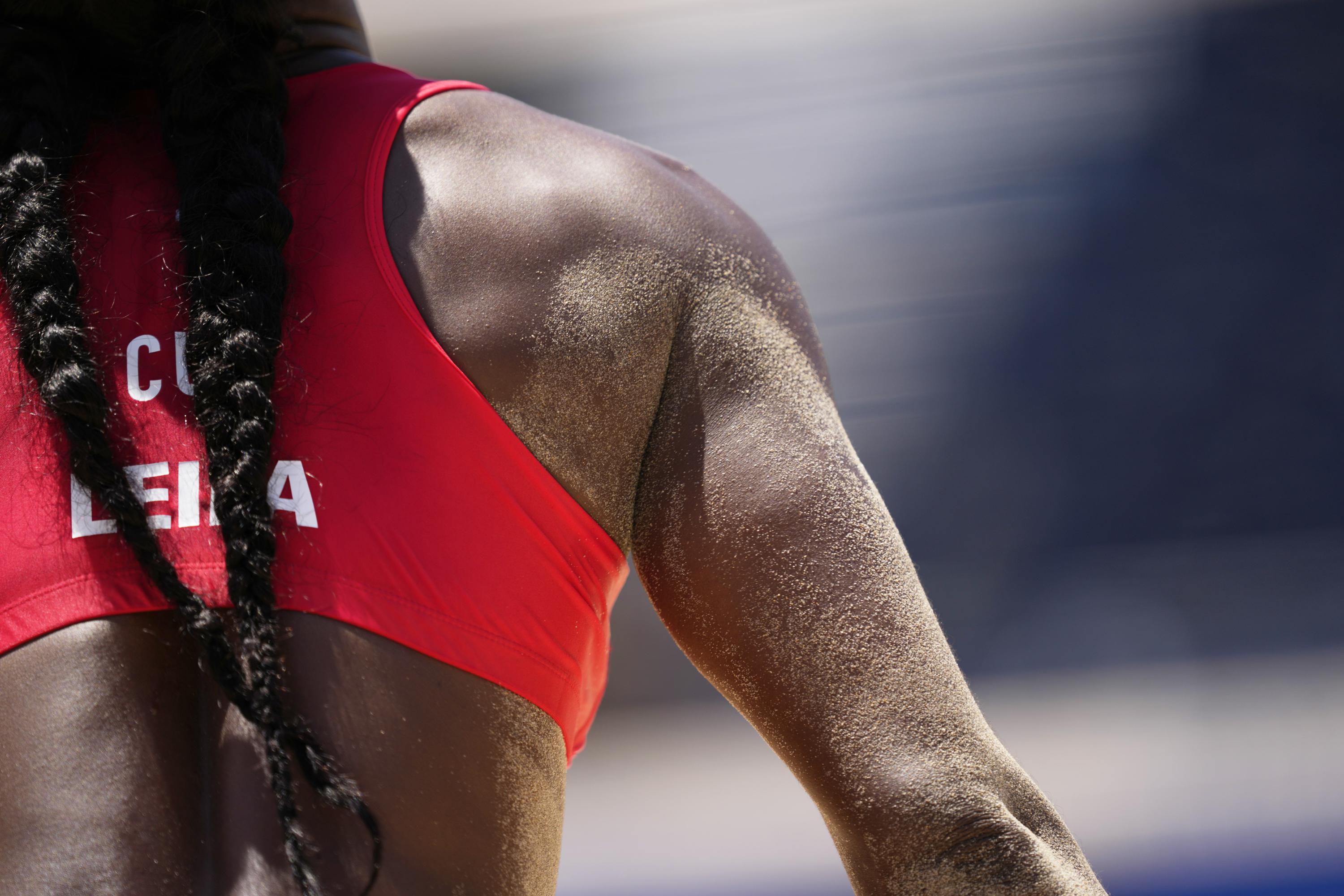 US women's beach volleyball team wears bikini bottoms after