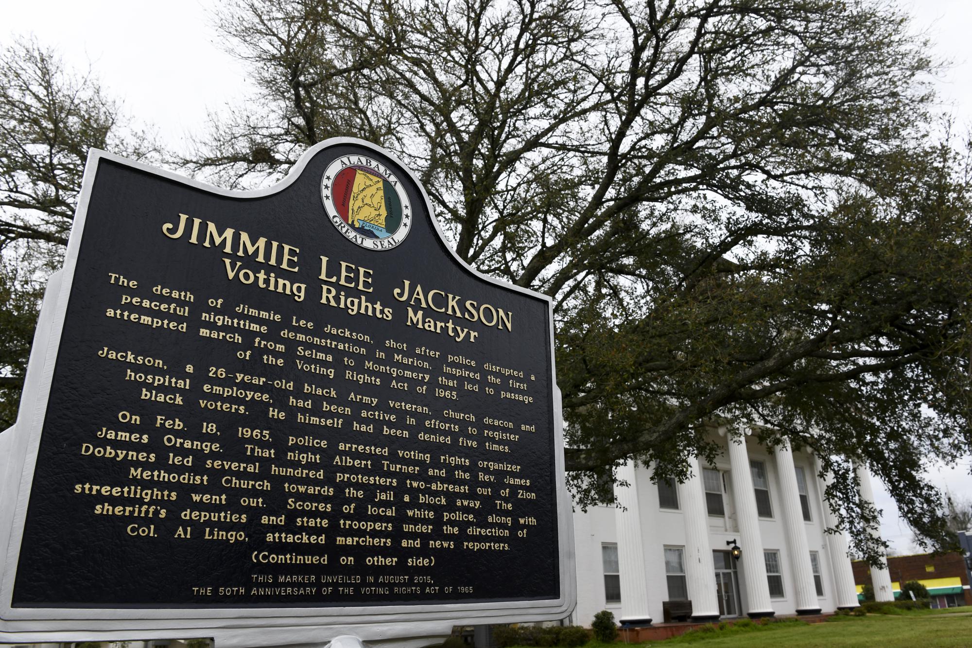 A historic marker honoring civil rights martyr Jimmie Lee Jackson near the Perry County Courthouse in Marion, Ala., on Feb. 16, 2020. Andrew Young, one of the last surviving members of Martin Luther King Jr.'s inner circle, recalled the journey to the signing of the Voting Rights Act as an arduous one, often marked by violence and bloodshed.(AP Photo/Julie Bennett, File)