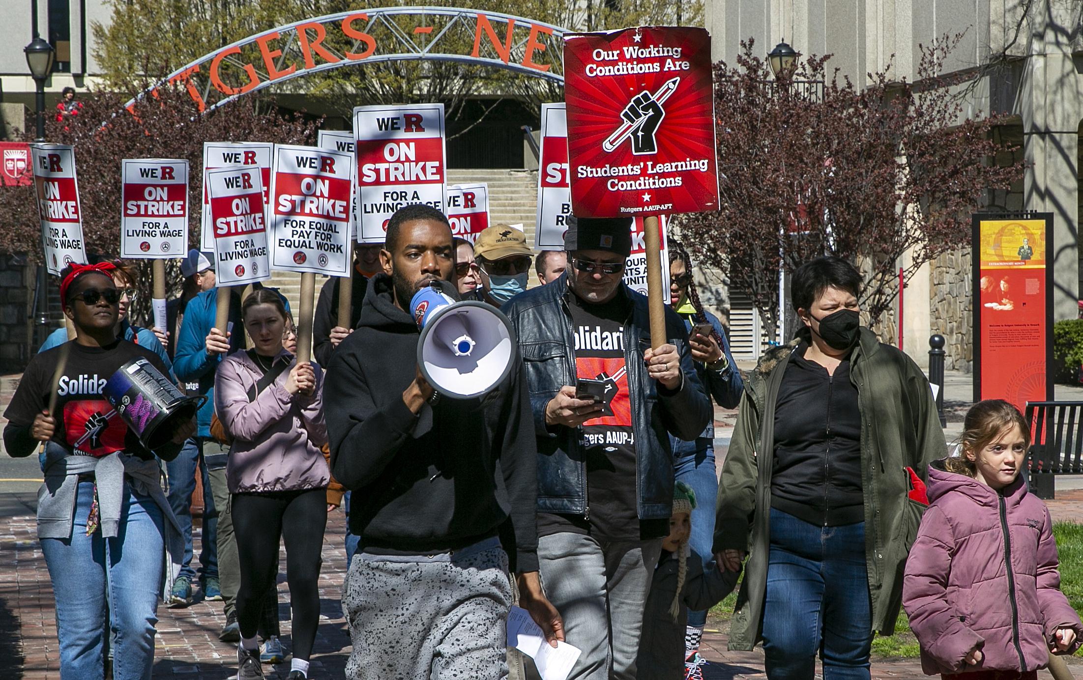 Rutgers' unions ratify new contracts, formally ending strike AP News