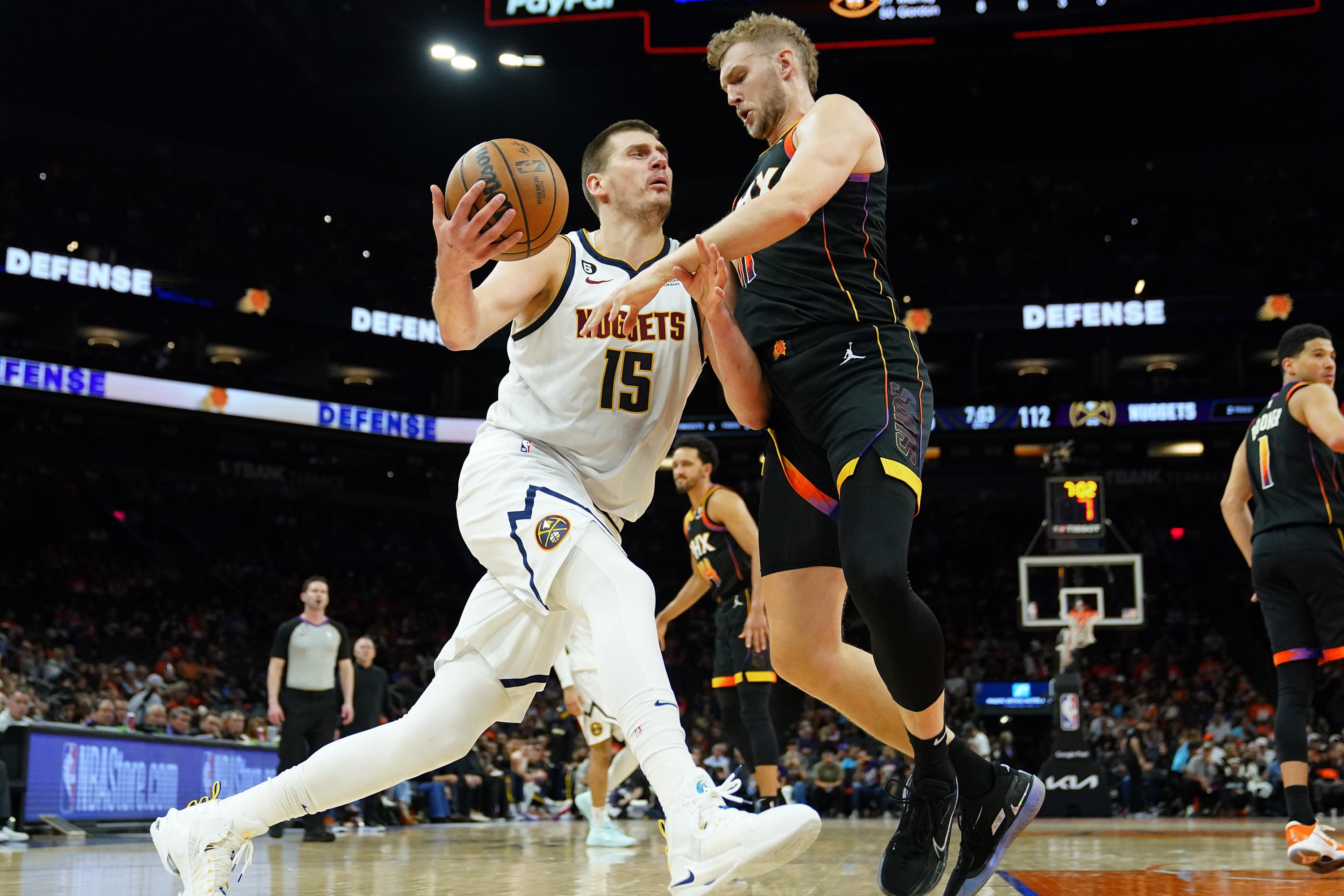 Phoenix Suns guard Landry Shamet warms up before Game 5 of an NBA basketball  second-round playoff series against the Denver Nuggets Tuesday, May 9,  2023, in Denver. (AP Photo/David Zalubowski Stock Photo 