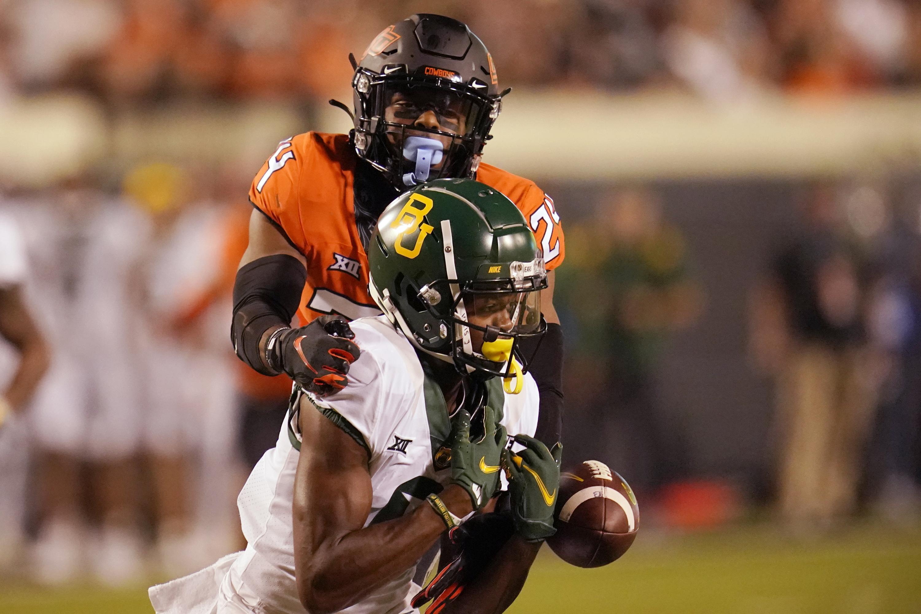 Warren helps No. 19 Oklahoma St. beat No. 21 Baylor 24-14 | AP News