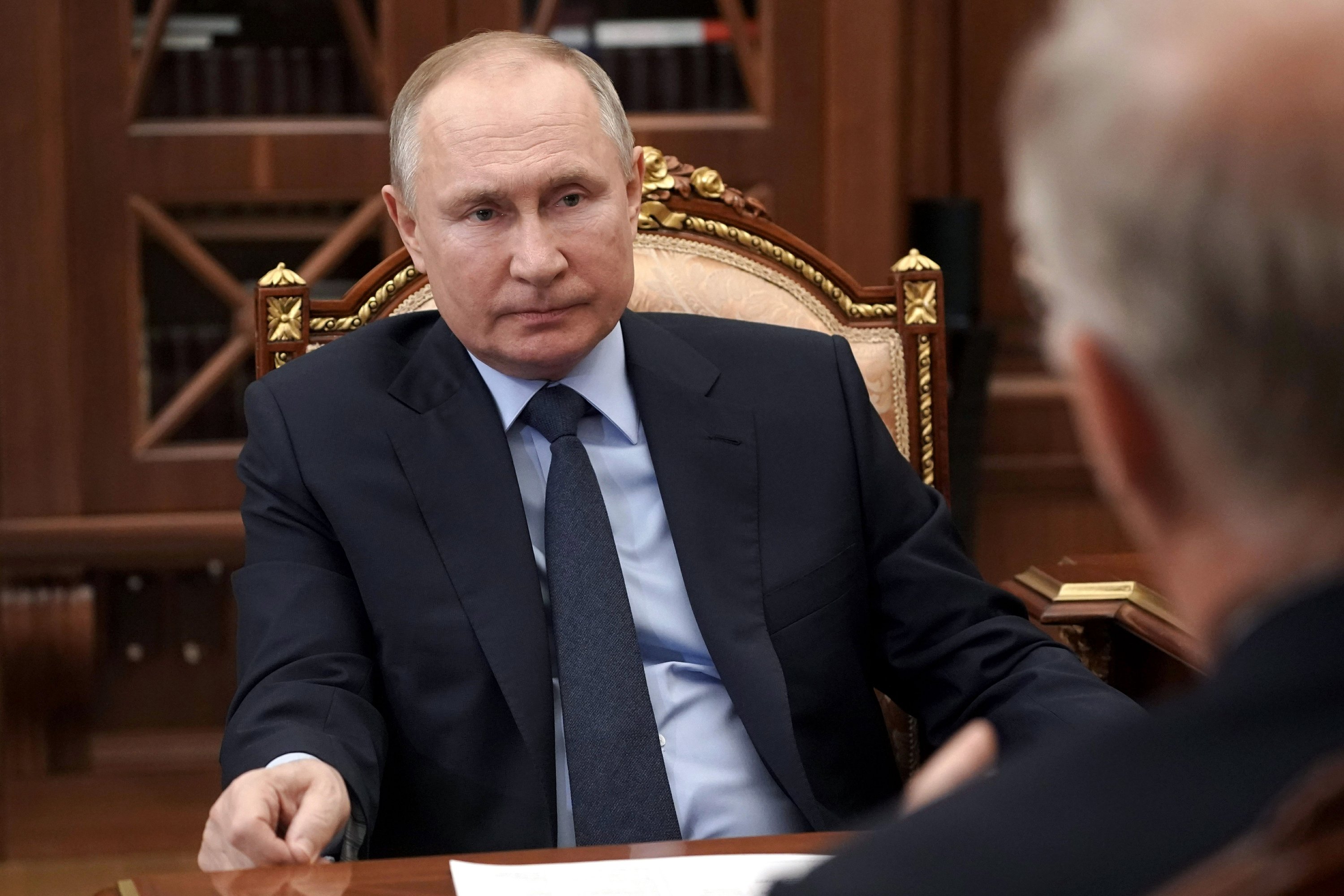 Putin signs law allowing him to serve two more terms