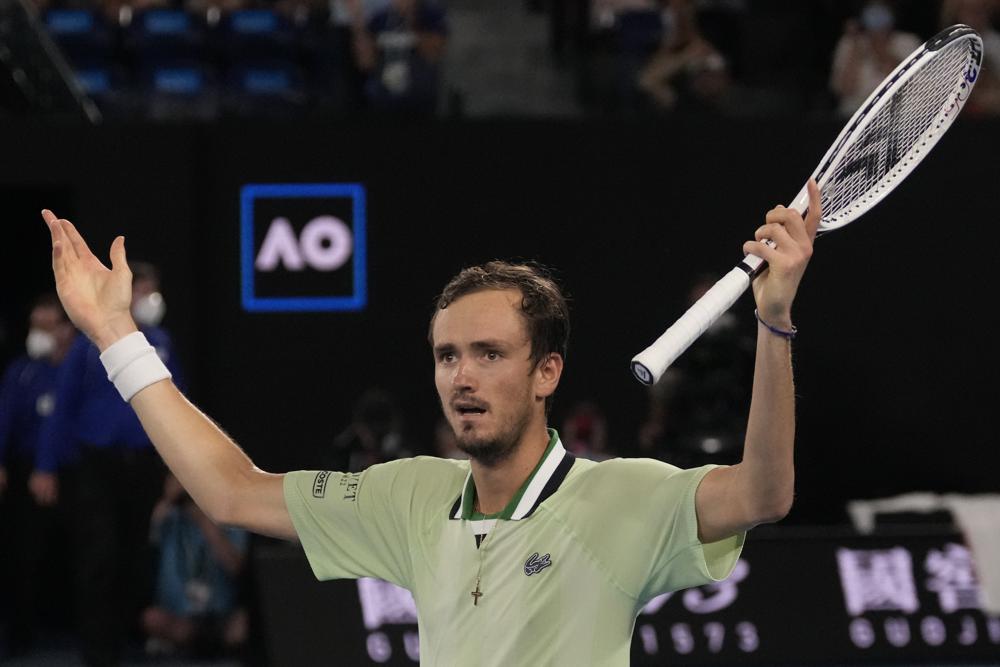 Daniil Medvedev of Russia reacts after winning the second set against Rafael Nadal of Spain during the men's singles final at the Australian Open tennis championships in Melbourne, Australia, Sunday, Jan. 30, 2022. (AP Photo/Simon Baker)
