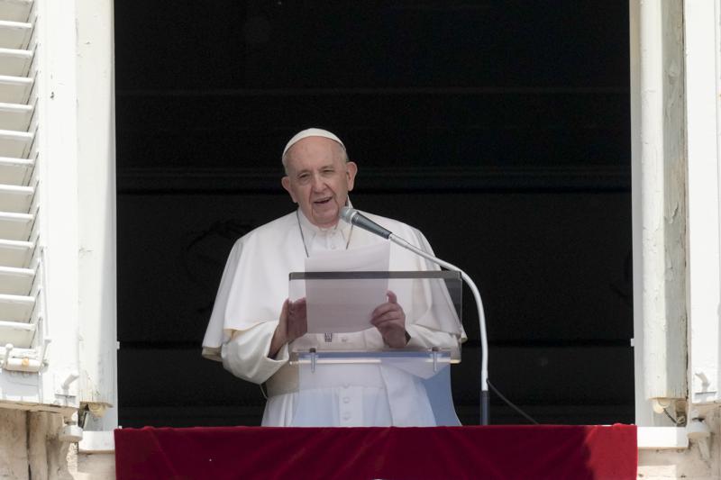 Pope Francis delivers his message during the Angelus noon prayer from the window of his studio overlooking St.Peter's Square, at the Vatican, Sunday, June 13, 2021. Francis demanded during his speech for humanitarian aid to reach residents of the war-torn Tigray region of northern Ethiopia, where Ethiopian and Eritrean soldiers are blocking food and other assistance. (AP Photo/Andrew Medichini)