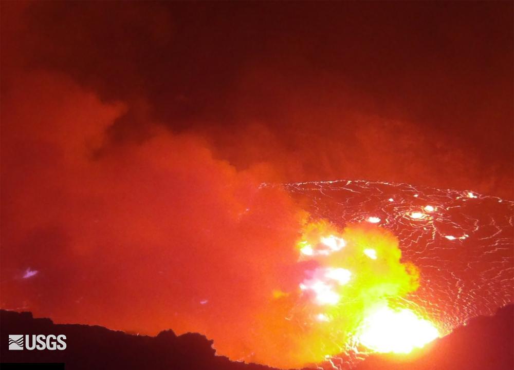 This webcam image provided by the United States Geological Survey shows a view of an eruption that has begun in the Halemaumau crater at the summit of Hawaii’s Kilauea volcano, Wednesday, Sept. 29, 2021. (USGS via AP)