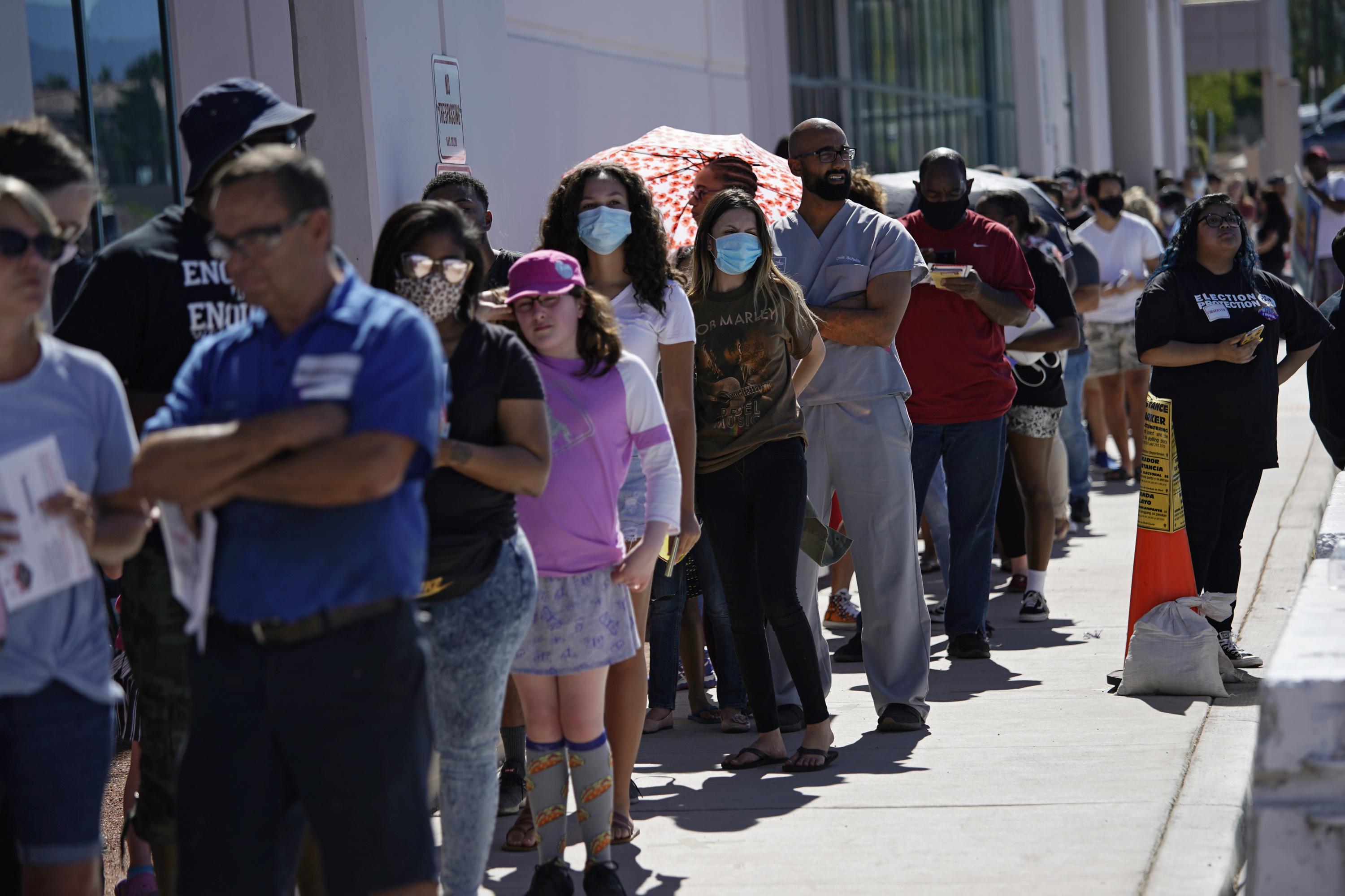 Long lines at few polling spots clog Nevada primary voting AP News