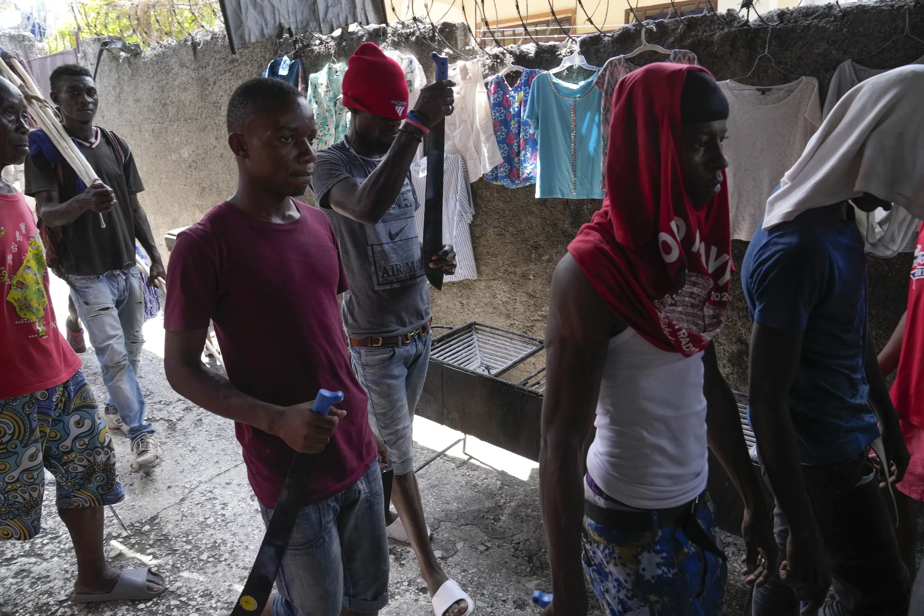 Vigilantes in Haiti strike back at gangsters with brutal street justice | AP News