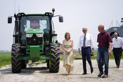President Joe Biden walks with O'Connor Farms owners Jeff O'Connor and Gina O'Connor, left, at the farm Wednesday, May 11, 2022, in Kankakee, Ill. Agriculture Secretary Tom Vilsack walks at right. Biden visited the farm to discuss food supply and prices as a result of Putin's invasion of Ukraine. (AP Photo/Andrew Harnik) President Joe Biden walks with O'Connor Farms owners Jeff O'Connor and Gina O'Connor, left, at the farm Wednesday, May 11, 2022, in Kankakee, Ill. Agriculture Secretary Tom Vilsack walks at right. Biden visited the farm to discuss food supply and prices as a result of Putin's invasion of Ukraine. (AP Photo/Andrew Harnik)