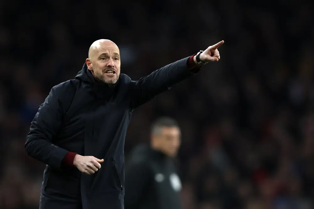 Manchester United's head coach Erik ten Hag gives instructions to his players during the English Premier League soccer match between Arsenal and Manchester United at Emirates stadium in London, Sunday, Jan. 22, 2023. (AP Photo/Ian Walton)