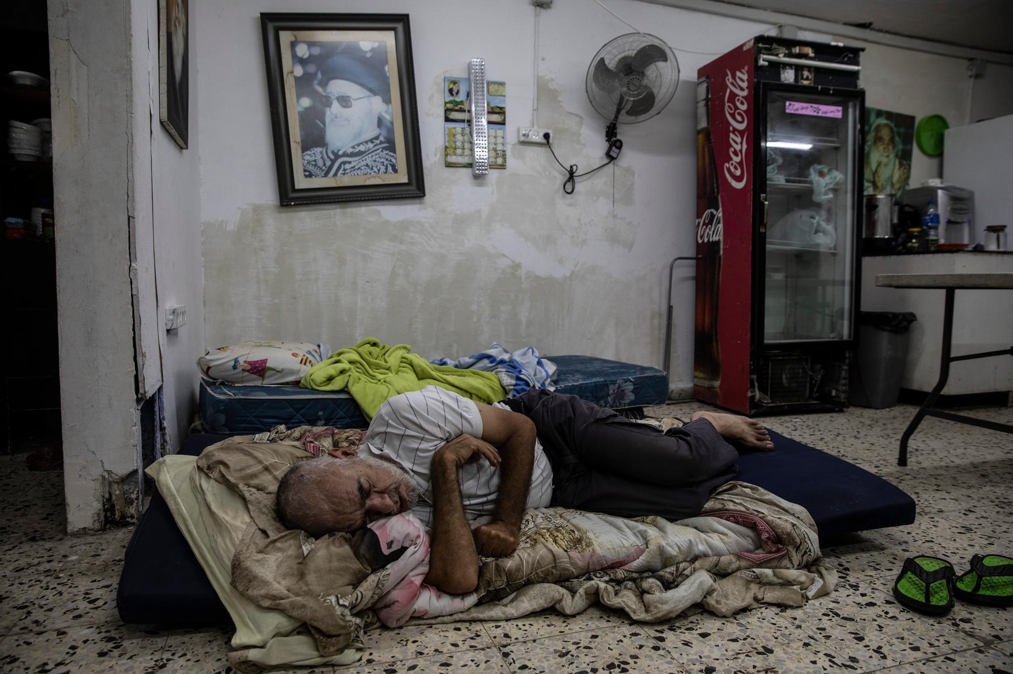 Daniel Turjman, 60, rests in a bomb shelter that is also used as a synagogue near his apartment building in Ashdod, Israel, on May 19, 2021, as fighting escalates between the Israeli military Hamas militants. (AP Photo/Heidi Levine)