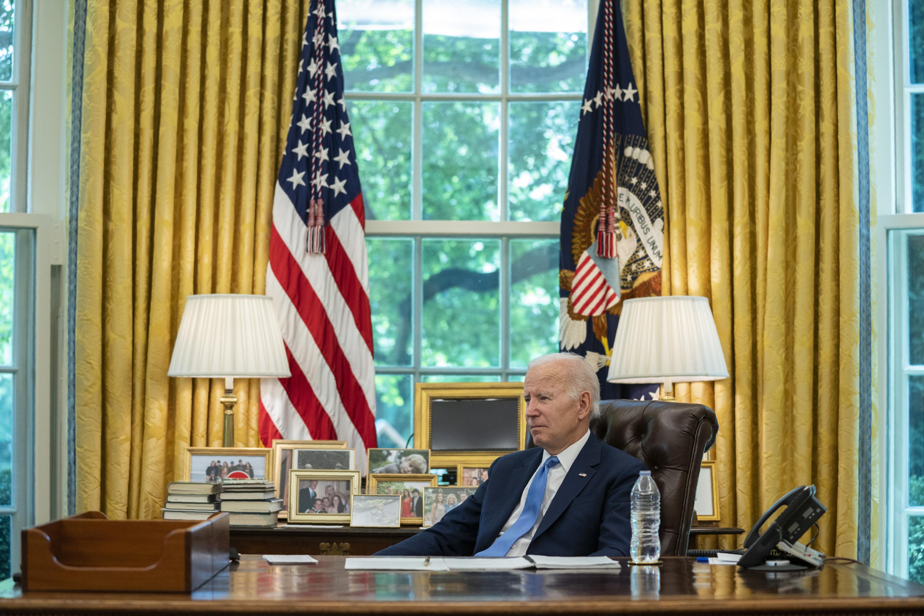 Plenty of proof that Biden has been in the Oval Office in 2022 | AP News