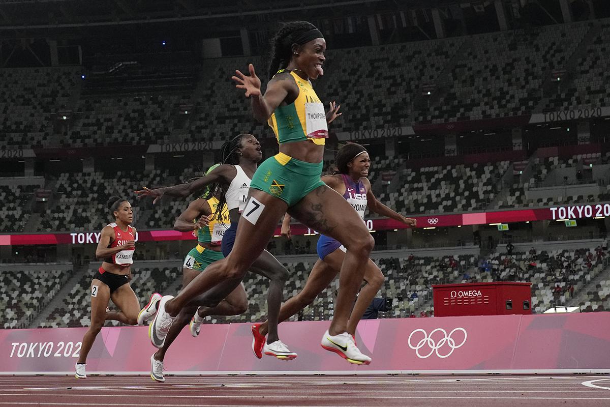 Elaine Thompson-Herah, of Jamaica, wins the final of the women's 200-meters at the 2020 Summer Olympics. (AP Photo/David J. Phillip)