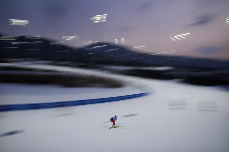 A Russian athlete trains during cross-country skiing session at the 2022 Winter Olympics, Wednesday, Feb. 9, 2022, in Zhangjiakou, China. (AP Photo/John Locher)