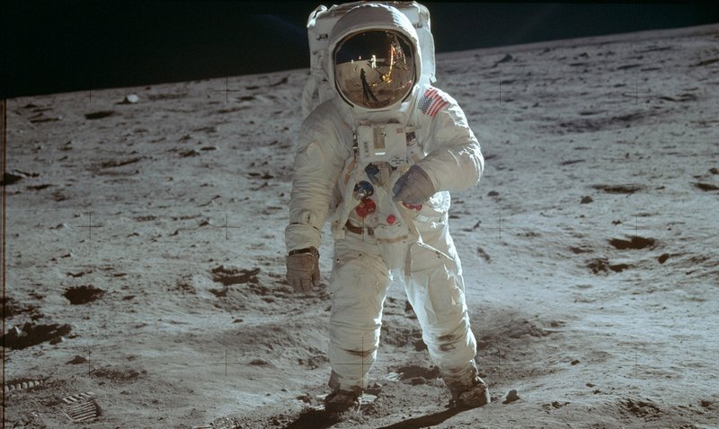 In this July 20, 1969 photo made available by NASA, astronaut Buzz Aldrin, lunar module pilot, walks on the surface of the moon near the leg of the Lunar Module "Eagle" during the Apollo 11 extravehicular activity. (Neil Armstrong/NASA via AP)