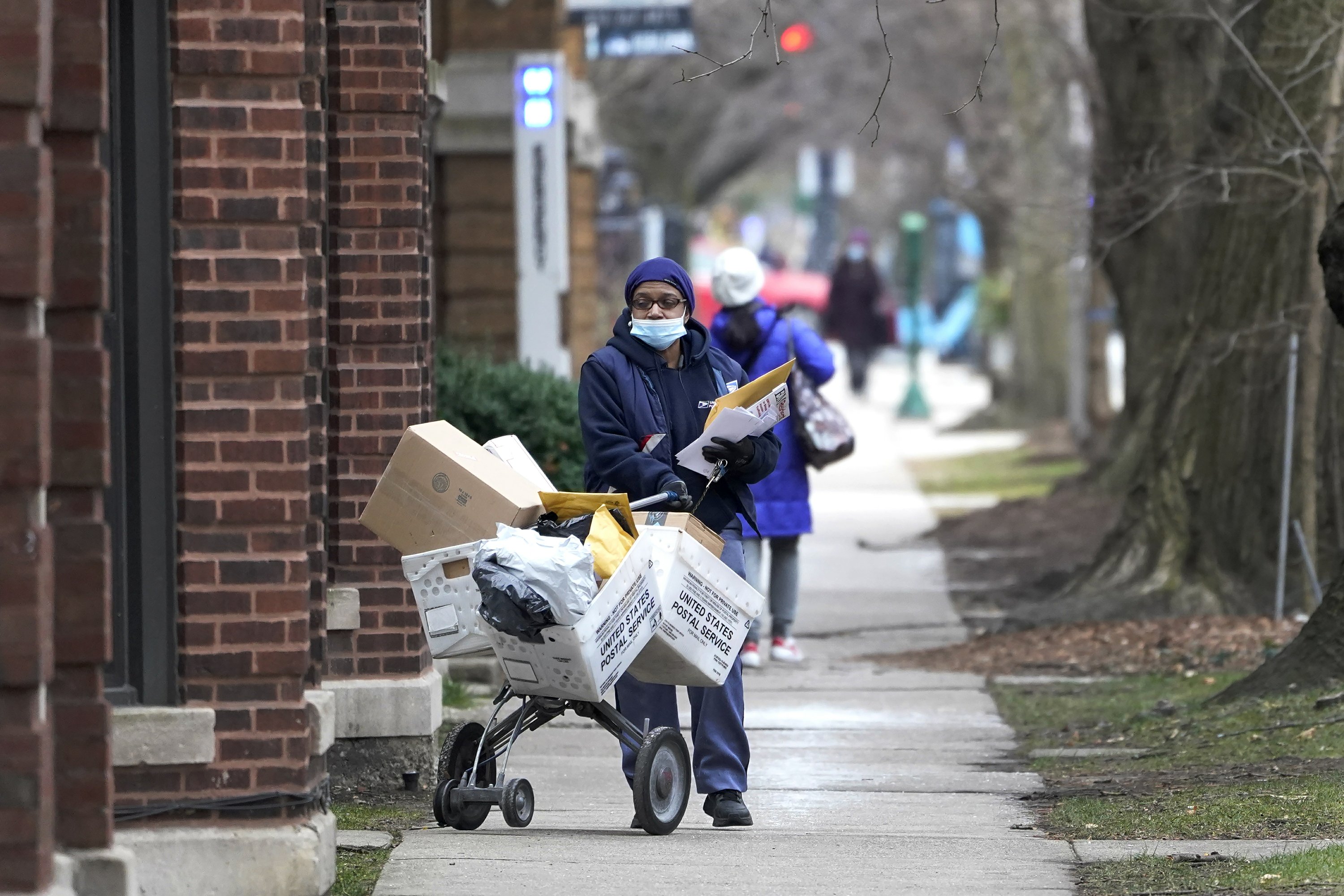 ‘Unprecedented’ mail volume delays Christmas gifts