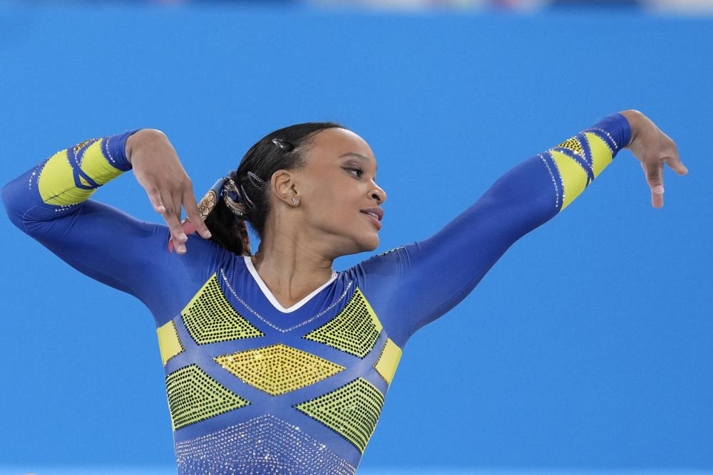 Rebeca Andrade, of Brazil, performs on the floor during the artistic gymnastics women's all-around final at the 2020 Summer Olympics, Thursday, July 29, 2021, in Tokyo. (AP Photo/Natacha Pisarenko)