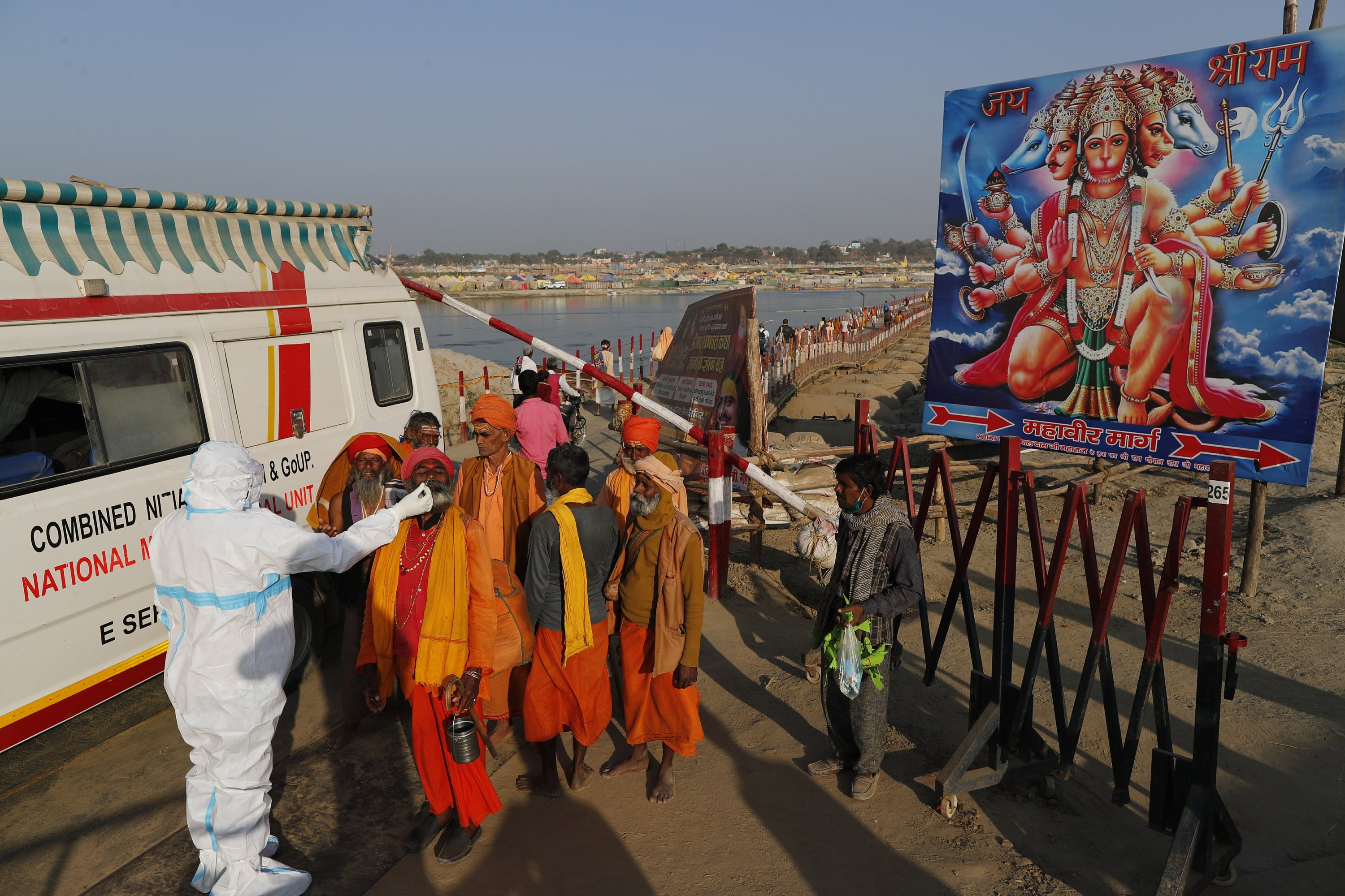 Hindu festival draws crowds of bathers to rivers