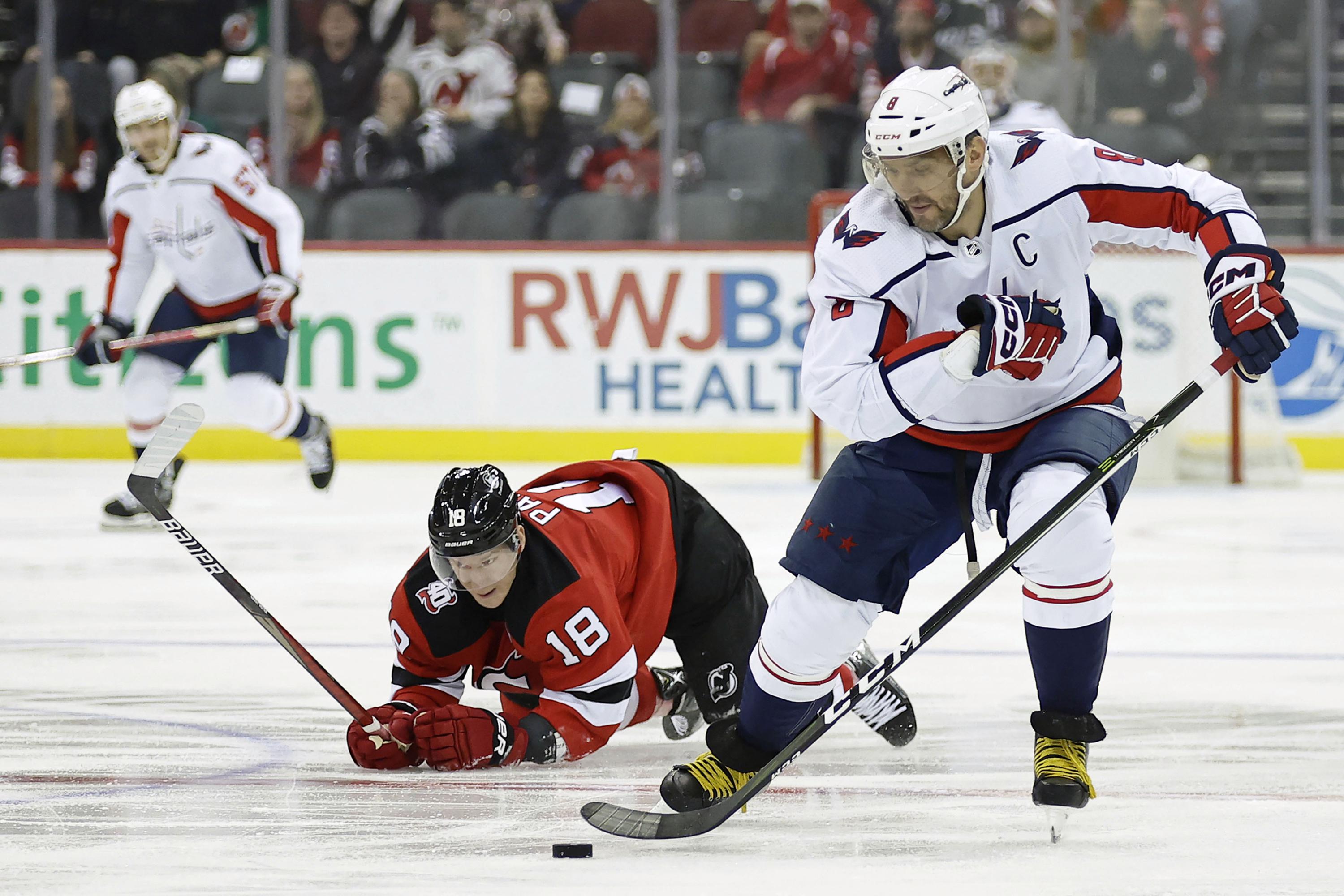 Ovechkin scores in 4-goal 2nd period, Capitals beat Devils | AP News