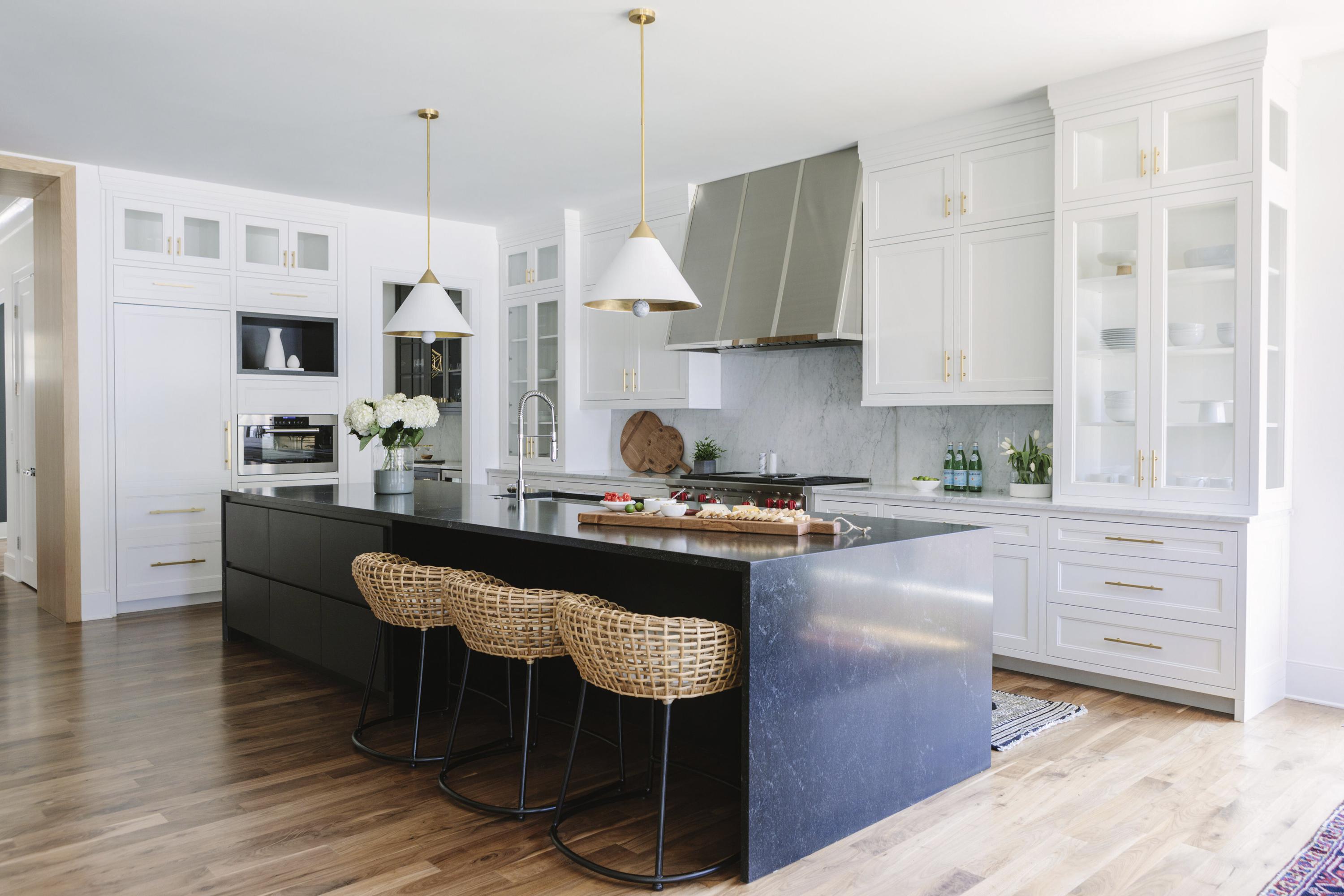 the concept of New Year's decor of a modern kitchen in light colors. front  view of the countertop with kitchen utensils and decorations 13941444 Stock  Photo at Vecteezy