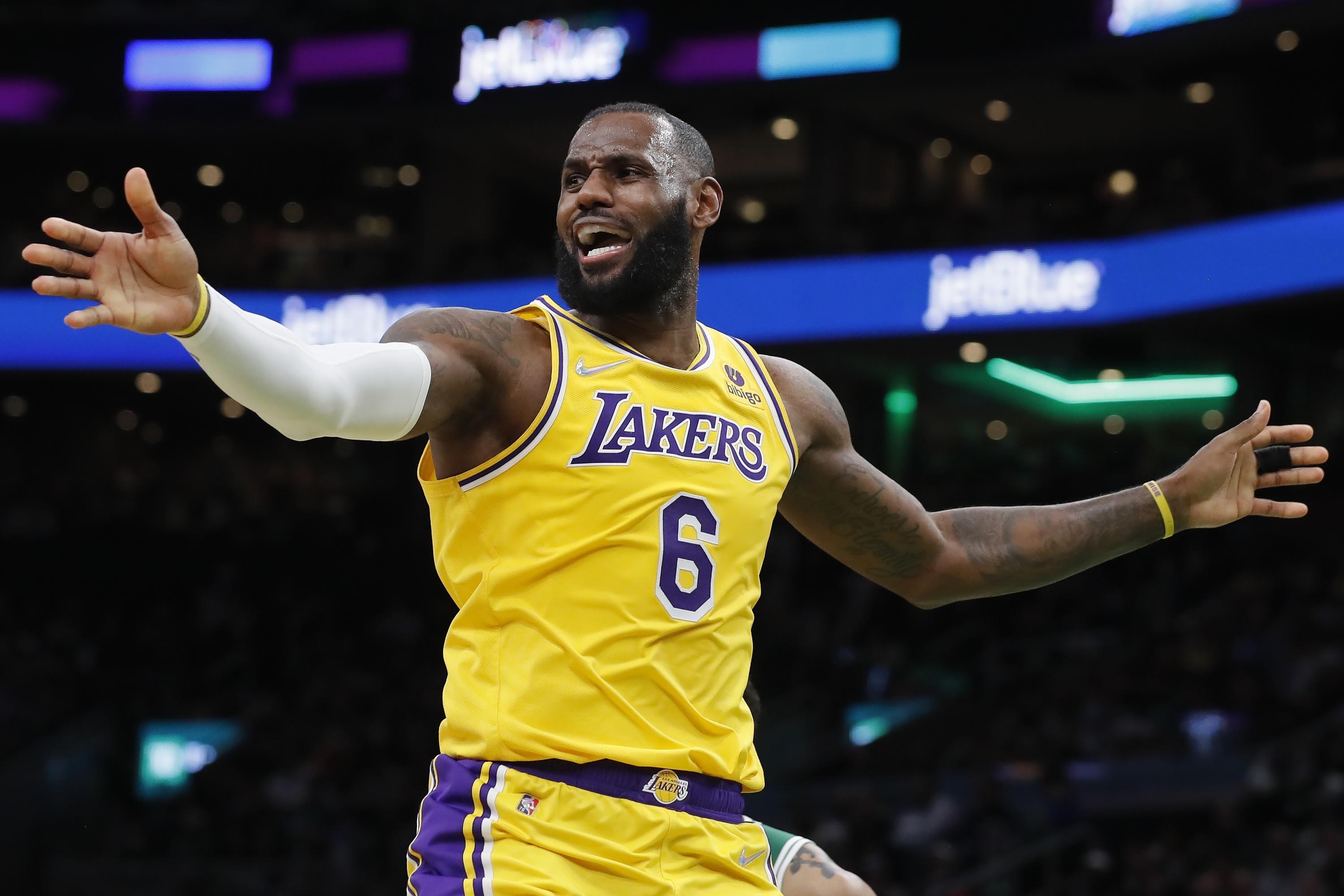 Jayson Tatum, Celtics spoil LeBron James' Lakers return | AP News