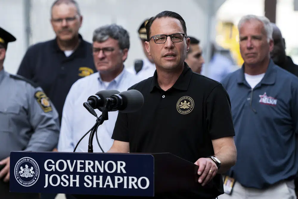 Pennsylvania Gov. Josh Shapiro speaks during a news conference following the collapse of an elevated section of Interstate 95 after a tanker truck caught fire, Sunday, June 11, 2023, in Philadelphia. (AP Photo/Joe Lamberti)