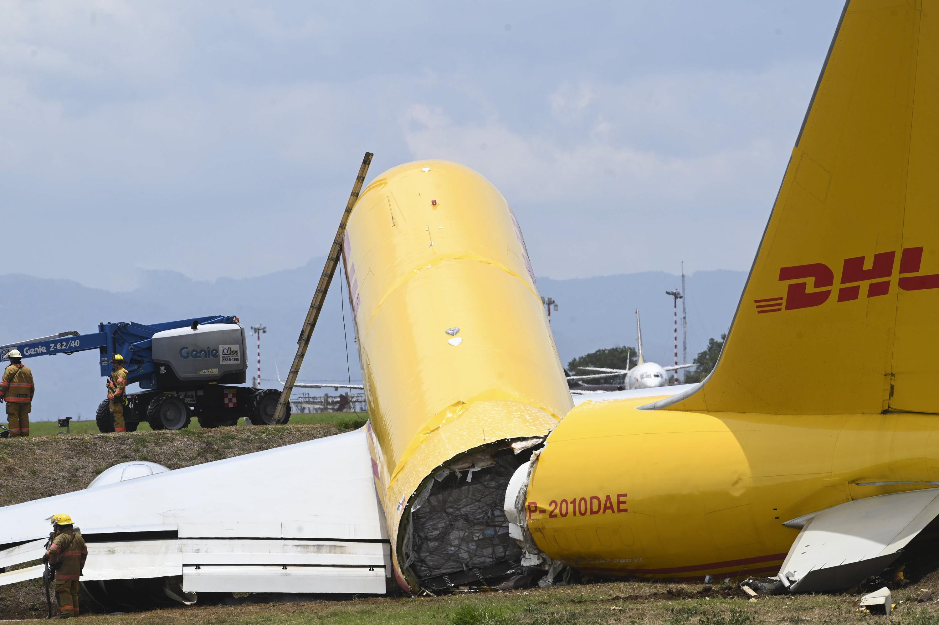 Cargo jet skids off runaway in Costa Rica, splits in half AP News