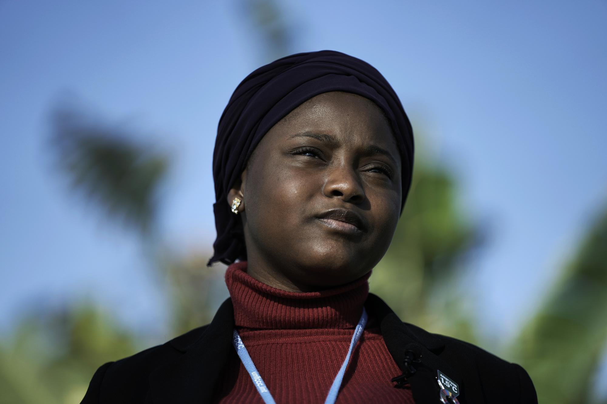 FILE - Nakeeyat Dramani Sam, of Ghana, poses for photos at the COP27 U.N. Climate Summit, Friday, Nov. 18, 2022, in Sharm el-Sheikh. Now 11, Sam is critical of the older generation, saying that "when they had all the power and authority, they didn't do much to stop global warming," but "at least some of them have listened," she says. (AP Photo/Nariman El-Mofty, File)