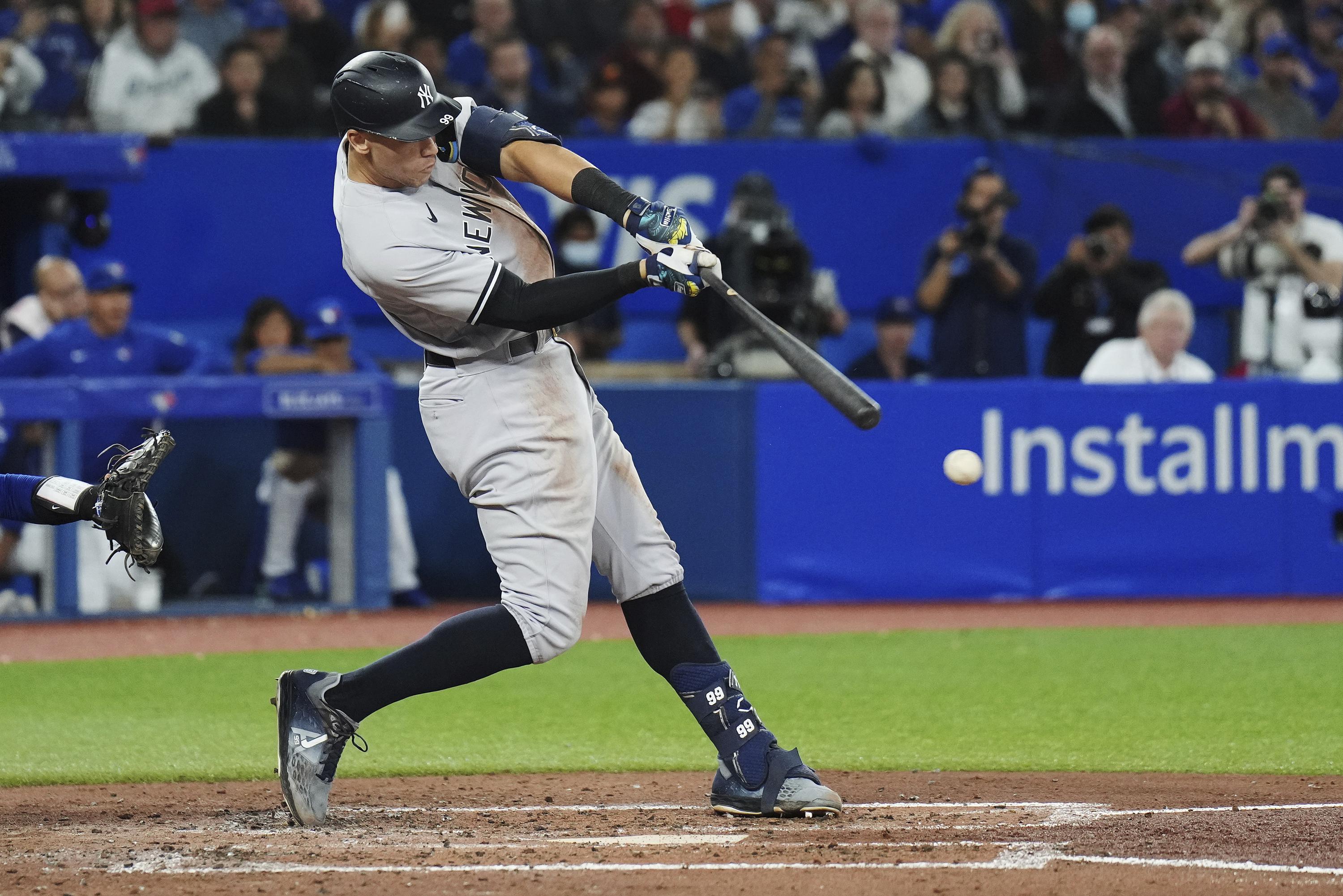 Yankees star Judge hits 61st home run, ties Maris' AL record | AP News