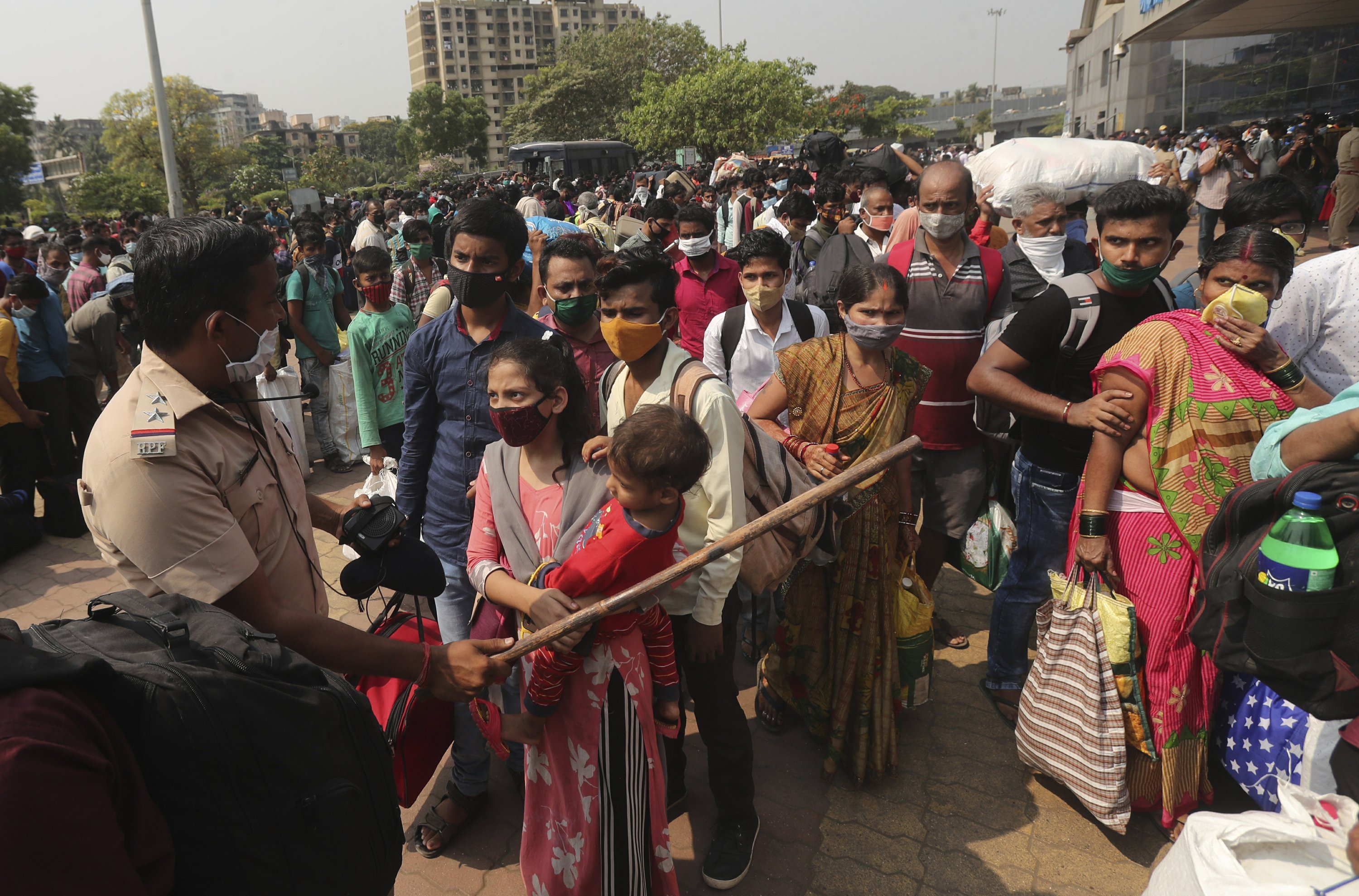 India's biggest cities shut down as new virus cases hit 200K