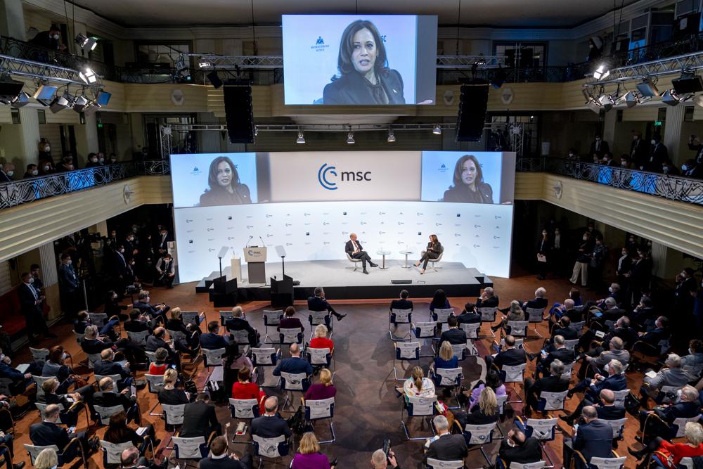 US Vice President Kamala Harris, right, accompanied by Munich Security Conference Chairman Wolfgang Ischinger, left, speaks during the Munich Security Conference, Saturday, Feb. 19, 2022, in Munich. (AP Photo/Andrew Harnik, Pool)