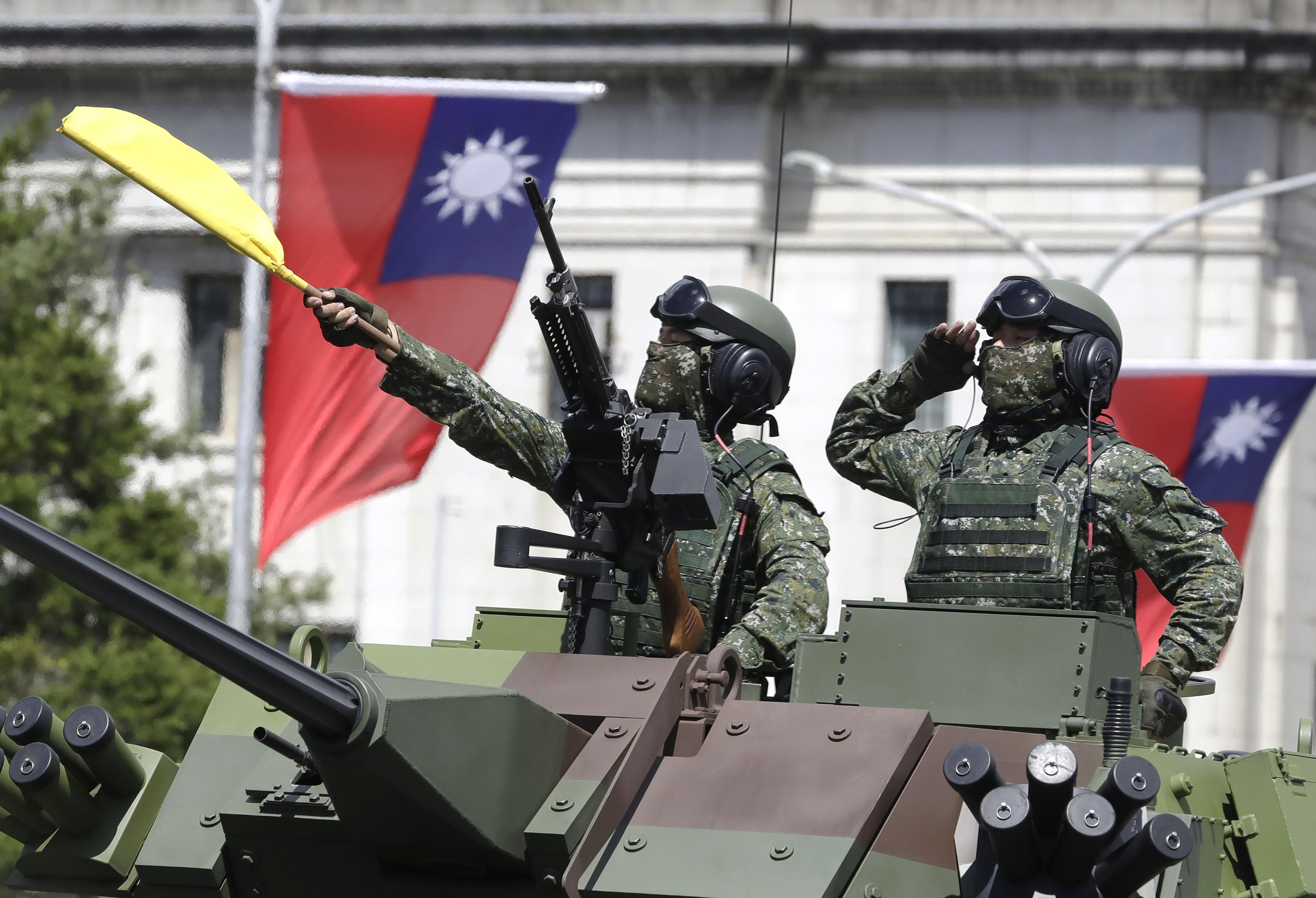 For all its parallels, Ukraine war feels distant in Taiwan | AP News