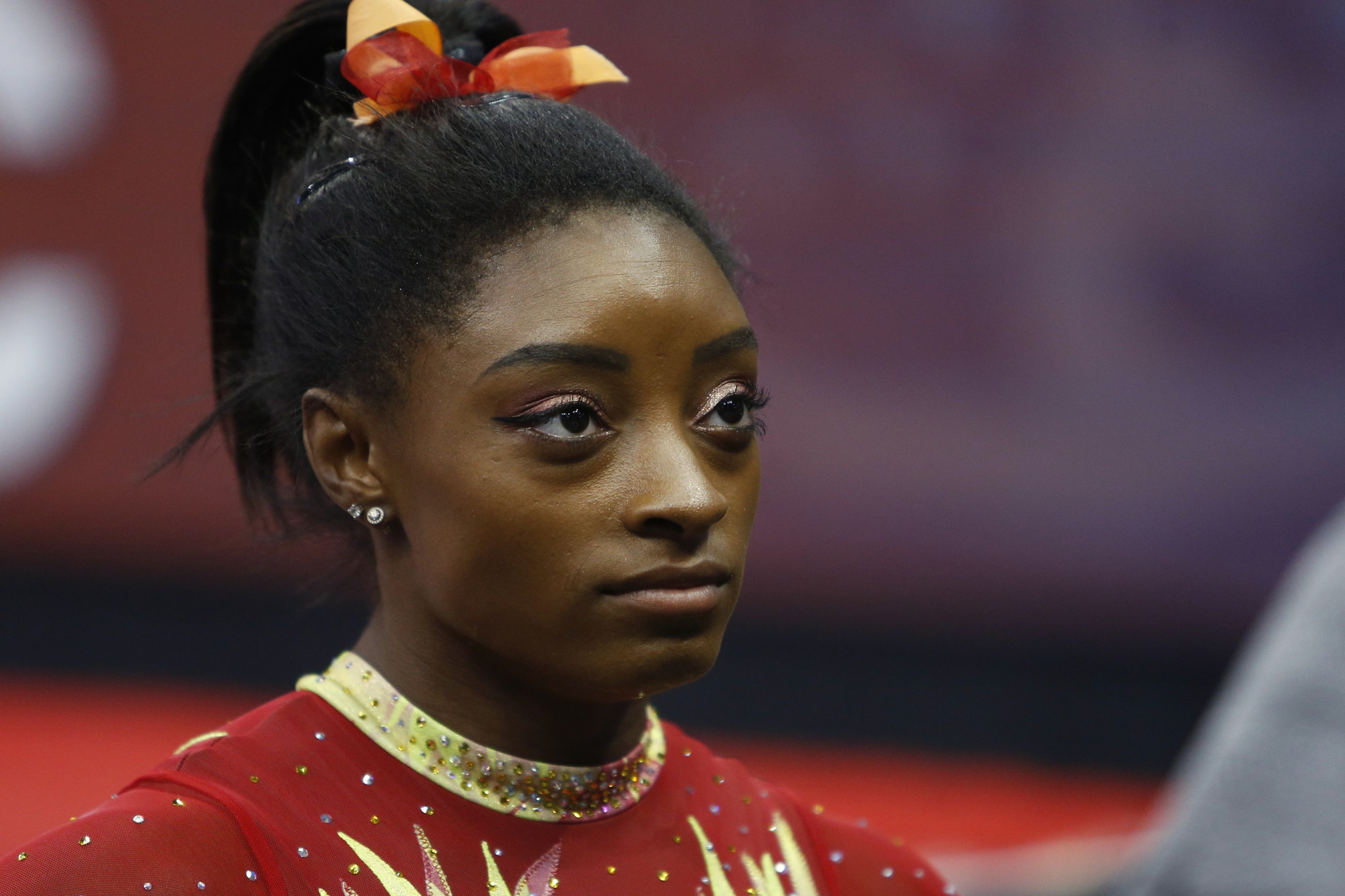 simone-biles-aches-for-victims-after-brother-charged-ap-news