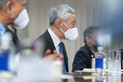 Singapore's Prime Minister Lee Hsien Loong speaks during a meeting with Secretary of Defense Lloyd Austin at the Pentagon, Monday, March 28, 2022, in Washington. (AP Photo/Andrew Harnik)