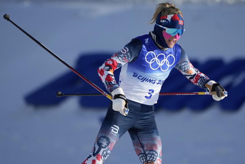 Norway's Therese Johaug during the women's 7.5km + 7.5km Skiathlon cross-country skiing competition at the 2022 Winter Olympics, Saturday, Feb. 5, 2022, in Zhangjiakou, China. (AP Photo/Aaron Favila)