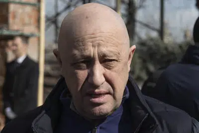 FILE - Yevgeny Prigozhin, the owner of the Wagner Group military company, arrives during a funeral ceremony at the Troyekurovskoye cemetery in Moscow, Russia, on April 8, 2023. On Friday, June 23, Prigozhin made his most direct challenge to the Kremlin yet, calling for an armed rebellion aimed at ousting Russia’s defense minister. The security services reacted immediately by calling for his arrest. (AP Photo/File)