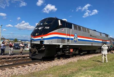 An Amtrak train leaves Burlington, Vt.,  for New York City on Friday, July 29, 2022. After a nearly 70-year absence, thepassenger train running from Vermont's revitalized Burlington train station to New York City is scheduled to head south Friday as part of a nationwide renewal of interest in rail travel. (AP Photo/Lisa Rathke)