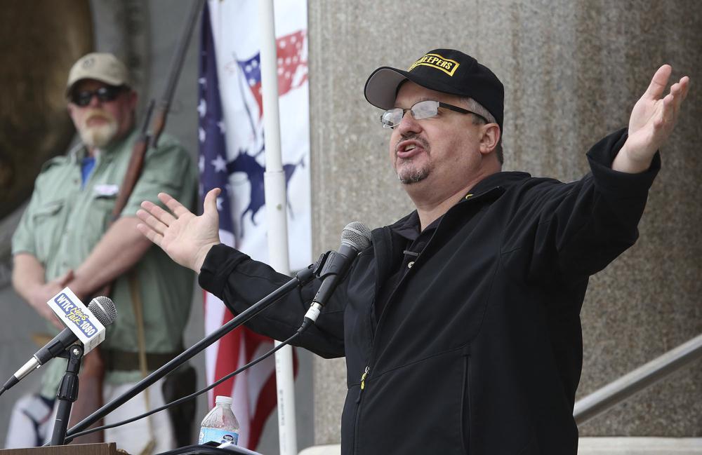 FILE - Stewart Rhodes, founder and president of the pro gun rights organization Oath Keepers speaks during a gun rights rally at the Connecticut State Capitol in Hartford, Conn., Saturday April 20, 2013. Rhodes has been arrested and charged with seditious conspiracy in the Jan. 6 attack on the U.S. Capitol. The Justice Department announced the charges against Rhodes on Thursday. (AP Photo/Journal Inquirer, Jared Ramsdell, File) MANDATORY CREDIT